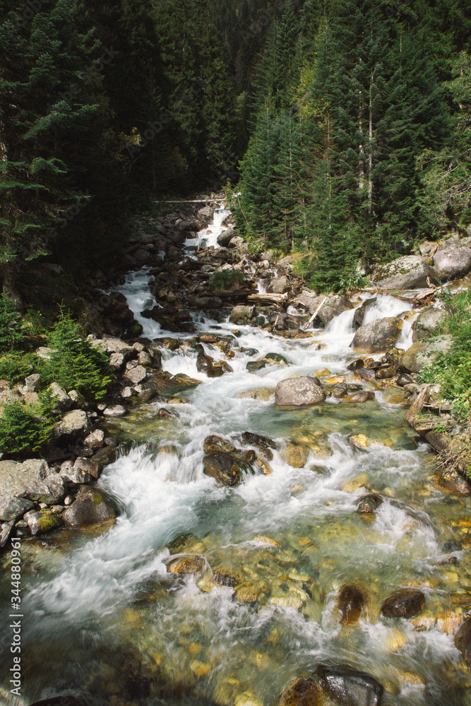 Beautiful waterfall in Dombay mountains in autumn season. Beautiful waterfall in Dombay mountains in autumn season.