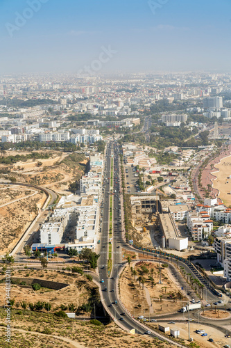 Big avenue with car traffic leading to famous resort called Agadir, Morocco