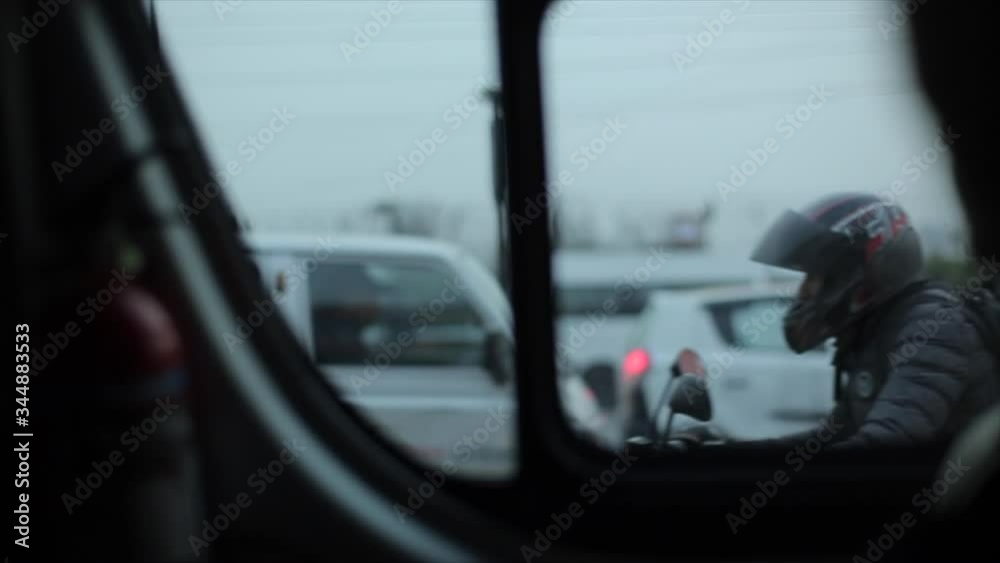 A close view on nepalese busy road from a moving car. Transportation.