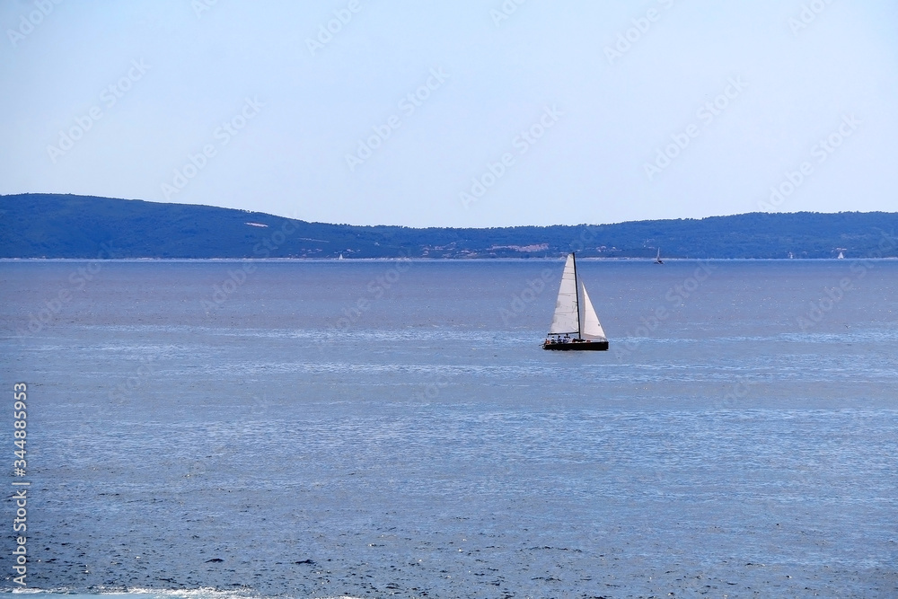 Obraz premium Sailing boat on the sea in southern Dalmatia region in Croatia. Beautiful landscape and bright summer day.