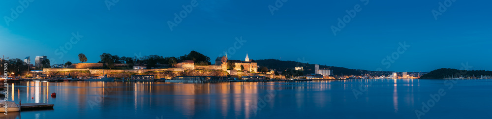 Oslo, Norway. Akershus Fortress In Summer Evening. Night View Of Famous And Popular Place. Panorama, Panoramic view