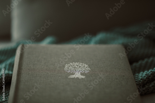 Photo album on a design blanket, a vintage setup