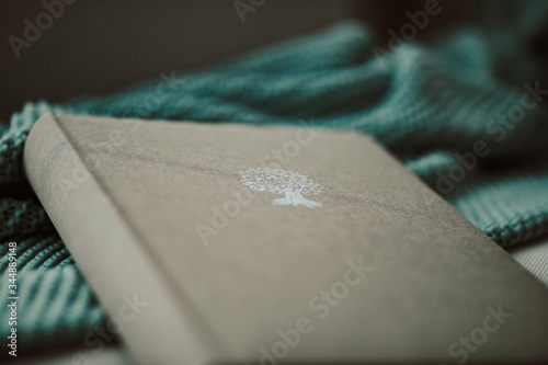 Photo album on a design blanket, a vintage setup
