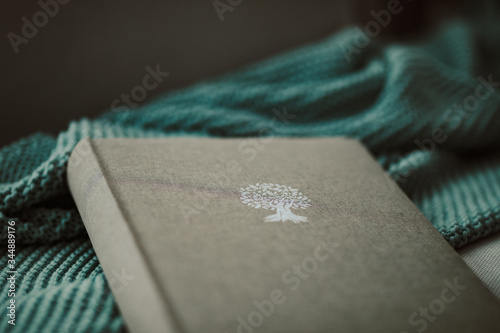 Photo album on a design blanket, a vintage setup