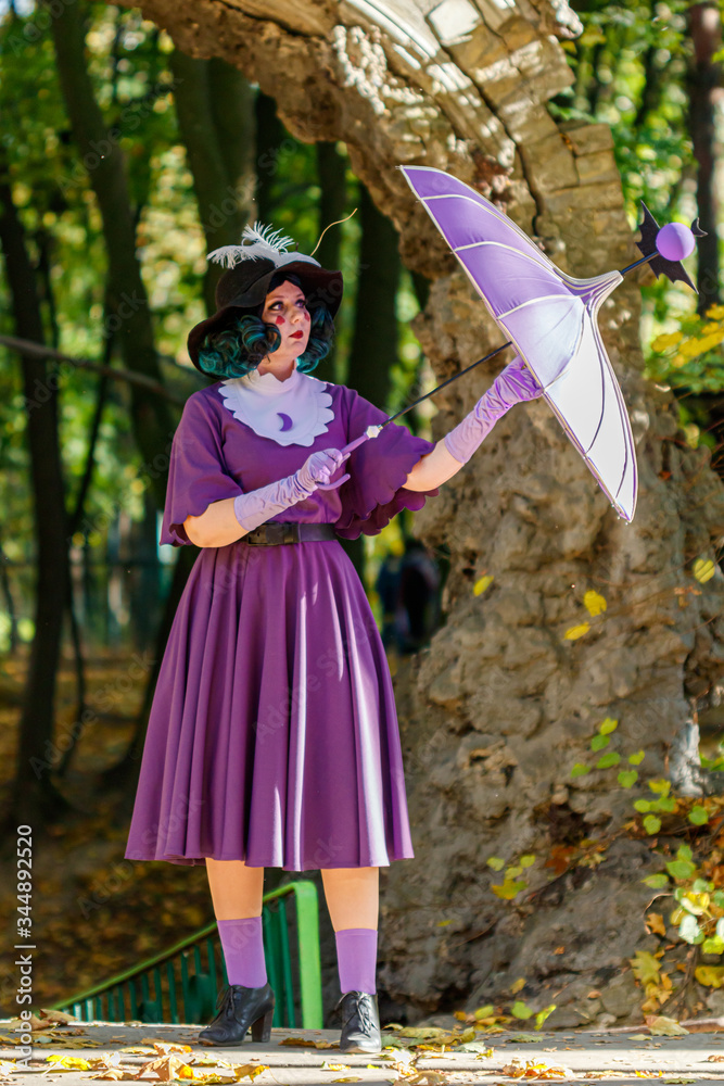 Girl Queen Eclipsa Butterfly, purple dress and umbrella