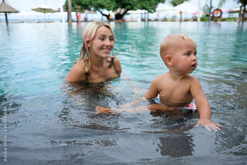 healthy family mother teaching baby swimming pool healthy family mother teaching baby swimming pool