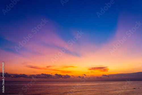 Fototapeta Naklejka Na Ścianę i Meble -  The setting sun over the Indian Ocean from Bali