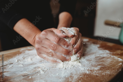 Hands preparing and kneading gnocchi 
