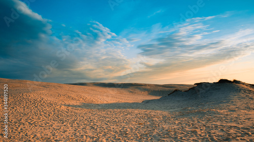 Big sand dune in golden sunset light