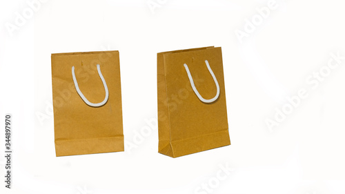 2 brown paper bags that cut off the background, forming a white background