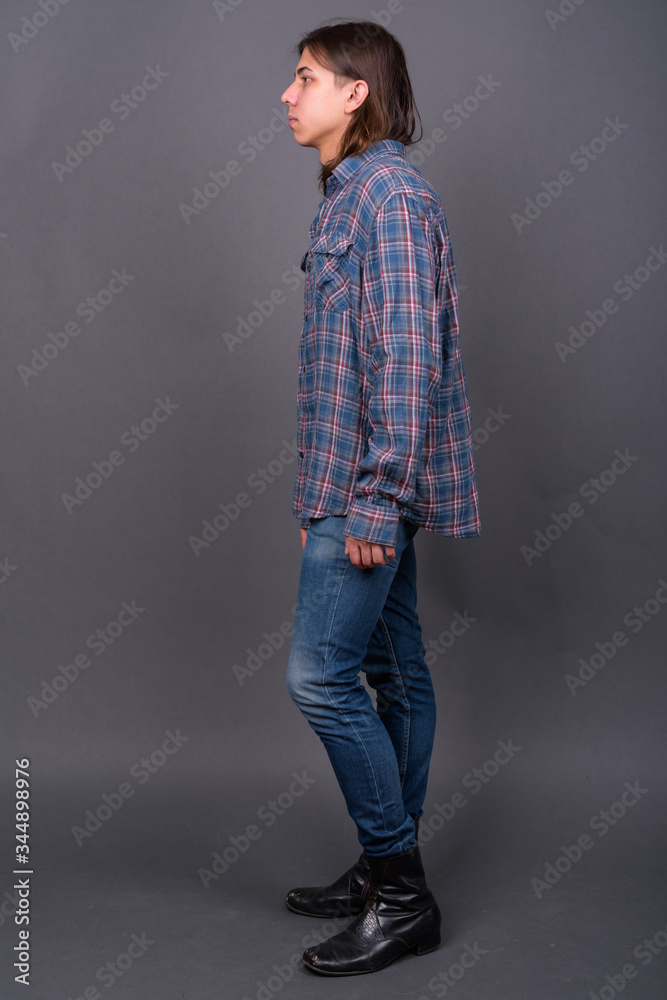 Young handsome hipster man with long hair Young handsome hipster man with long hair