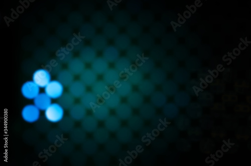 Blue, green circles on a dark background © Василий Васильев