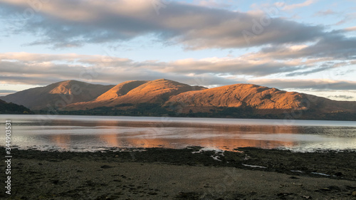 sunset across loch linnhe on the mountains