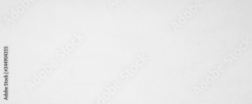 White pastel rough crack cement texture stone concrete,rock plastered stucco wall, painted flat fade background gray solid floor.