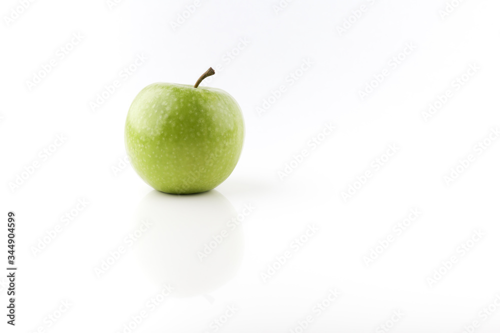 green apple on white background close up green apple on white background close up
