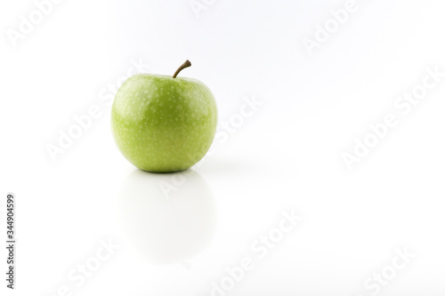 green apple on white background close up