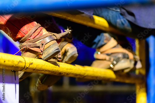 Detail of cowboy boots during rodeo in Brazil.