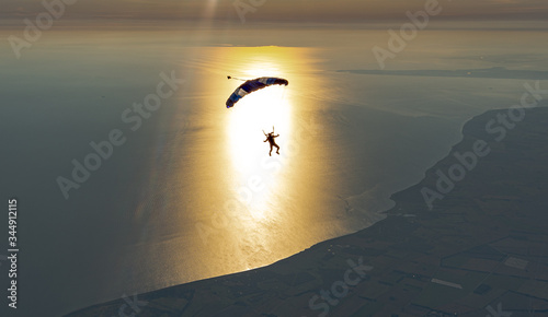 Skydiving/paragliding at the sea