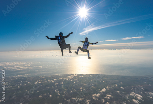 skydiving jumping at the sea