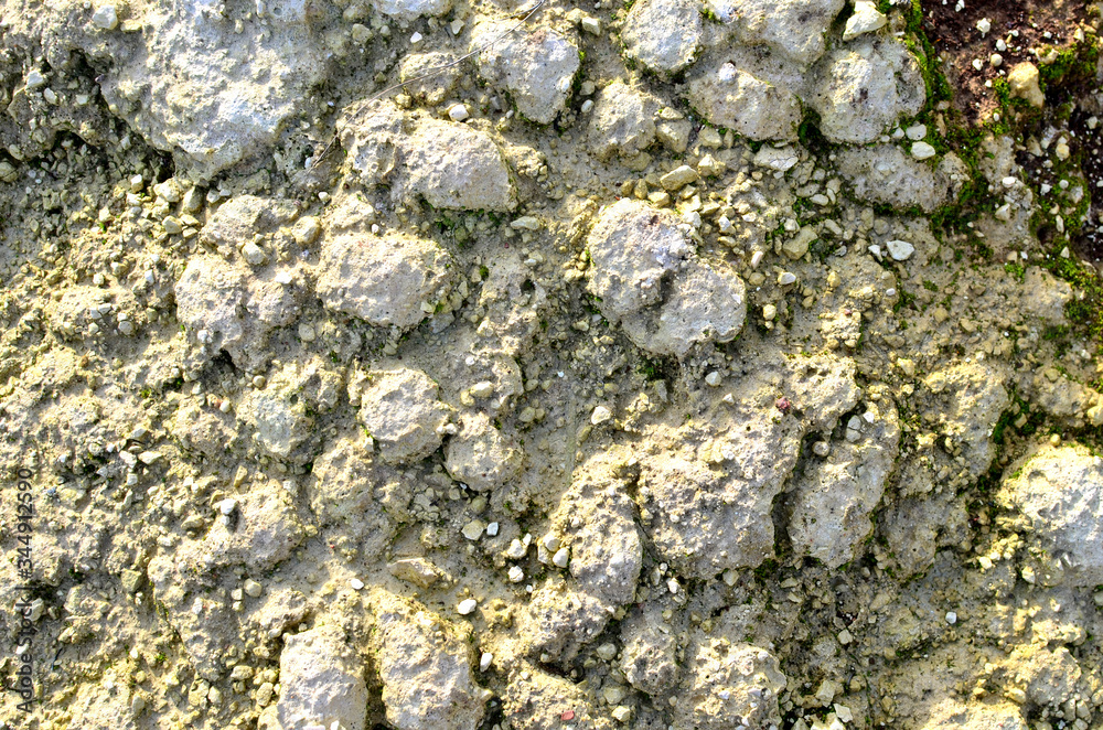Natural chalk stones background. Chalk is a soft, white, porous, sedimentary carbonate rock, a form of limestone composed of the mineral calcite. Rock forms from the ooze. Mining concept Natural chalk stones background. Chalk is a soft, white, porous, sedimentary carbonate rock, a form of limestone composed of the mineral calcite. Rock forms from the ooze. Mining concept