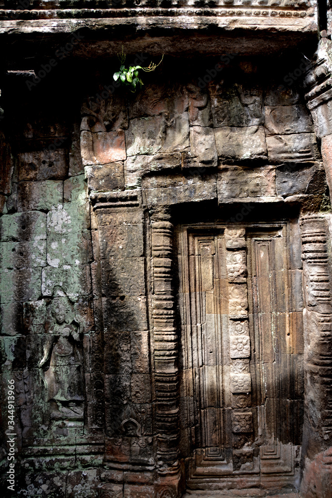 Delicate carvings in one of Angkor's temples, Cambodia