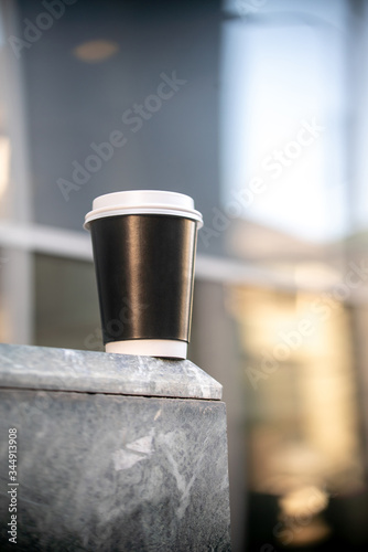 Cup of coffee on the street city sunlight sunset sunrise daylight coffeebreak marble