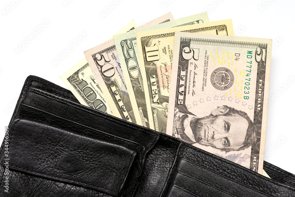 dollar bills peeking out of a wallet on a white background dollar bills peeking out of a wallet on a white background