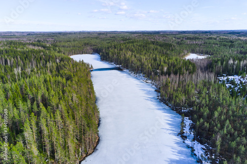 Aerial view of ice-covered Kallio lake Finland. North-Karelia nature.