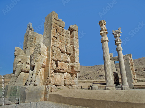 Remains of the Gates of All Nations in Persepolis. It's decorated by mythical bulls Lamassu with human heads. Entrance is leading to Apadana palace. Shot near Shiraz, Iran photo