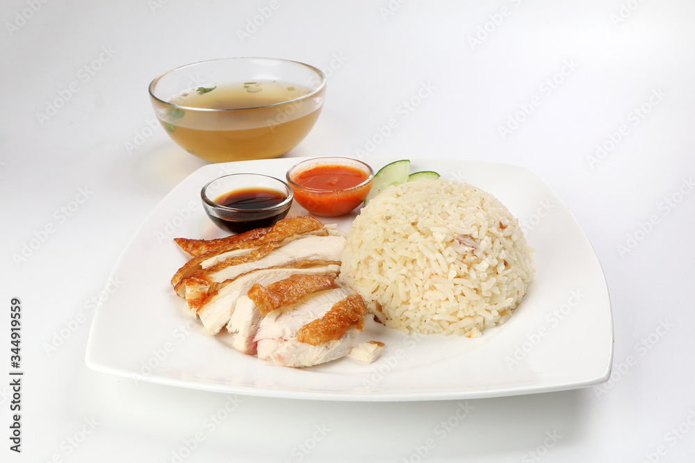 South east asian style chicken rice set steamed roasted sliced chicken with soup dark chilli sauce malaysia china