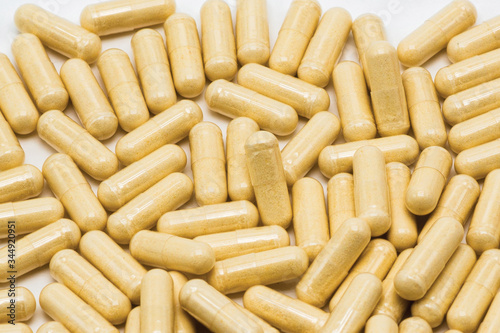 Vegetarian capsules on a light background