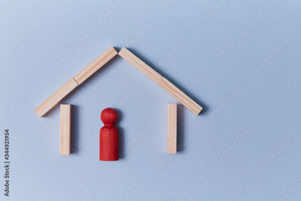 Naklejka premium Insularity and cliquishness. Unfrequented, remote. Loneliness and isolation. Wooden house, lonely person figure inside