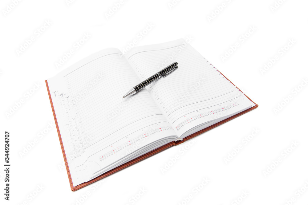 Pen and notebook on a white background, business and education. Isolated Pen and notebook on a white background, business and education. Isolated