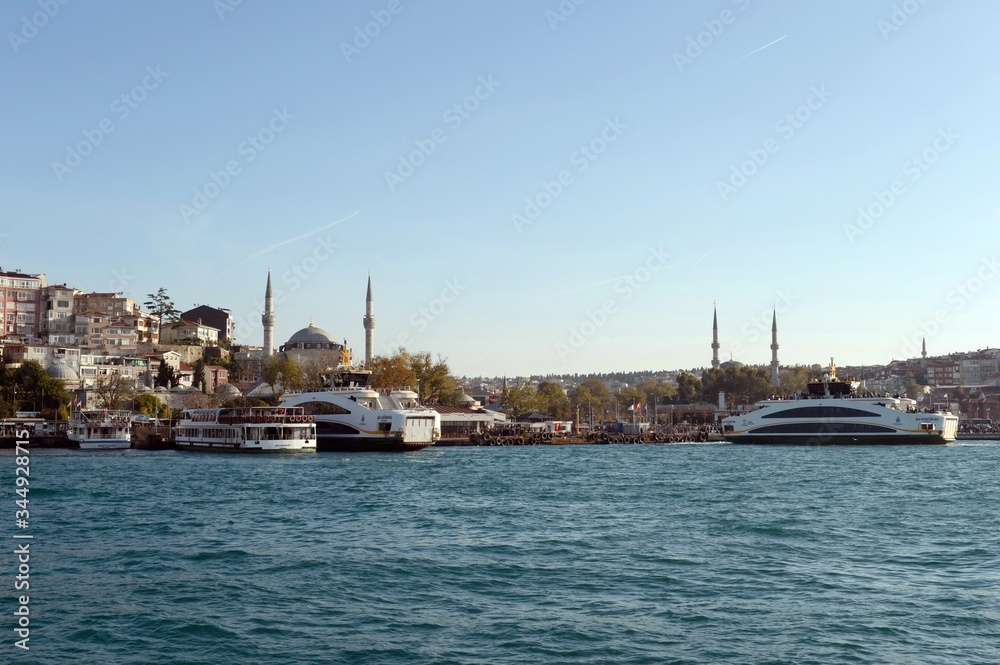 Passenger ships in the Bosphorus Strait at the Uksyudar Shehir Khatlary Isklesi Maritime Station on the Asian side of Istanbul