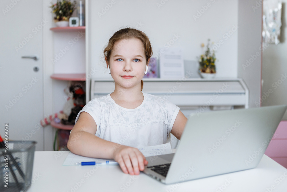 Girl at the table with laptop. Girl at the table with laptop.