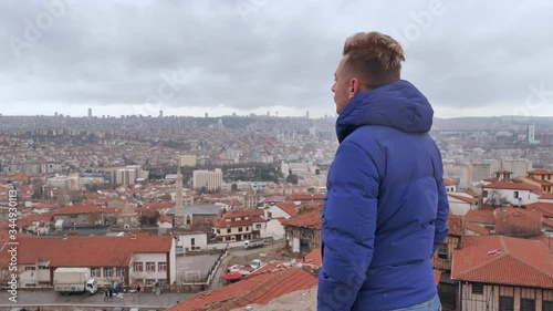 A tourist looks at the panorama of Ankara, the capital of Turkey. photo