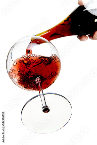 bottom view of red wine being poured