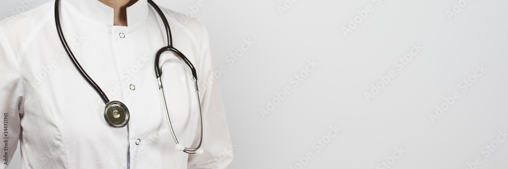 Female doctor in uniform with stethoscope Female doctor in uniform with stethoscope