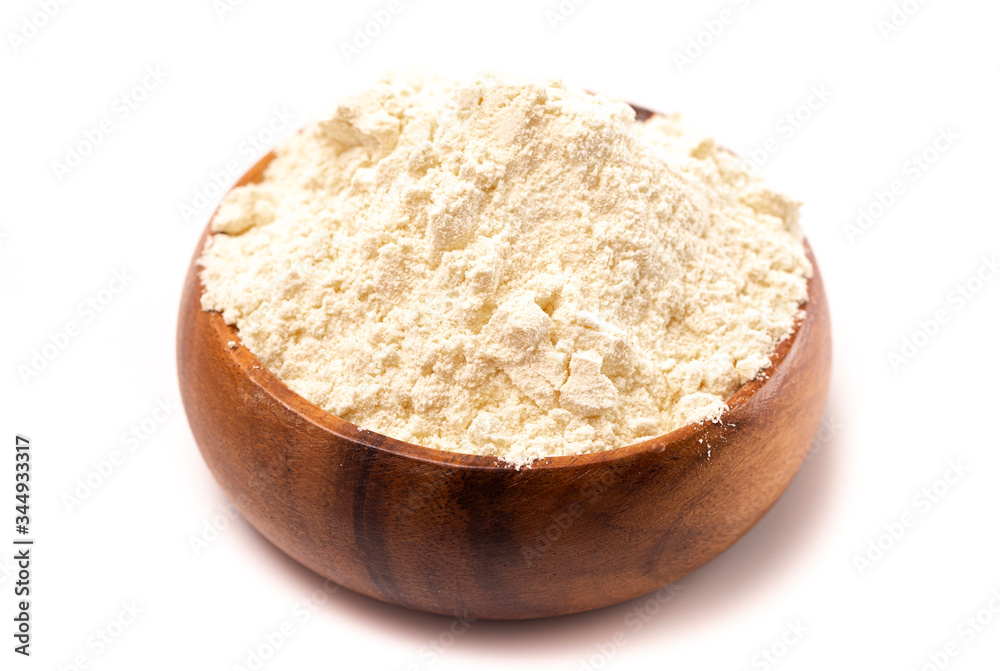 Bowl of Millet Flour in a Wood Bowl Isolated on a White Background Bowl of Millet Flour in a Wood Bowl Isolated on a White Background