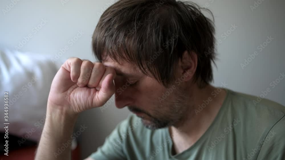 Depressed man at home Depressed man at home