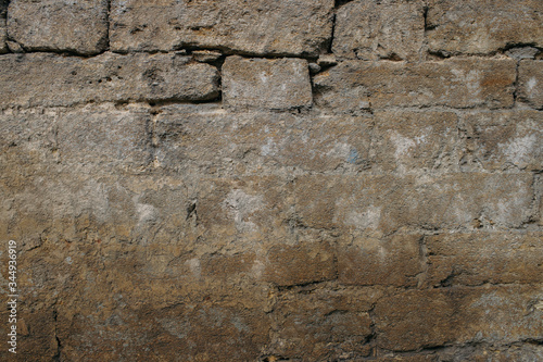 texture of an old wall with natural stone masonry