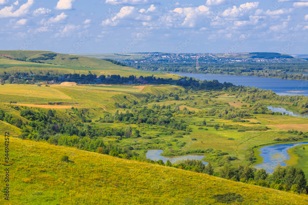 view of the valley of the river Vyatka and flood meadows from the high bank