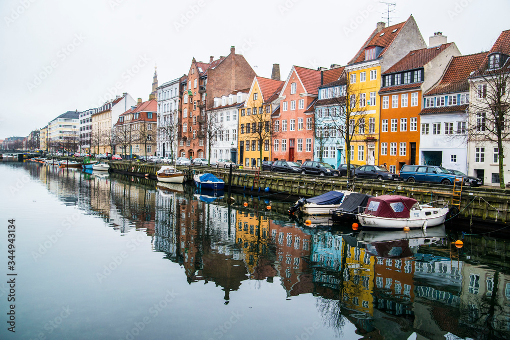 Fototapeta premium colorful townhomes of Copenhagen Denmark along the canal