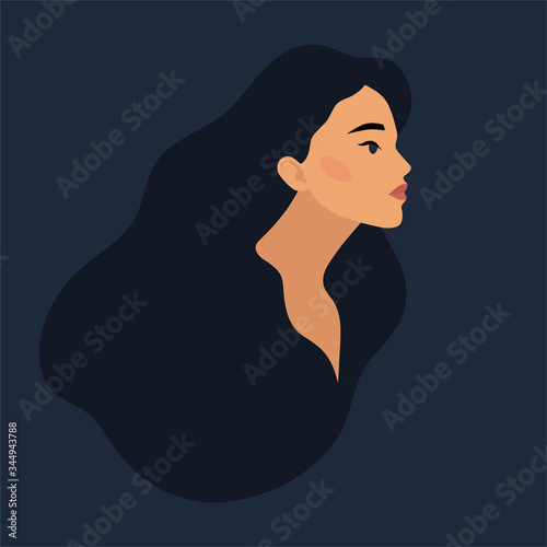 Profile of a beautiful woman with magnificent hair. Portrait of a girl