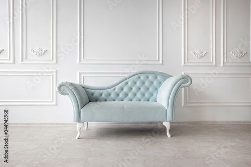Baroque sofa. Vintage furniture. Pastel blue sofa with carriage tie. Restoration of vintage furniture. Furniture manufacturing. Interior design.