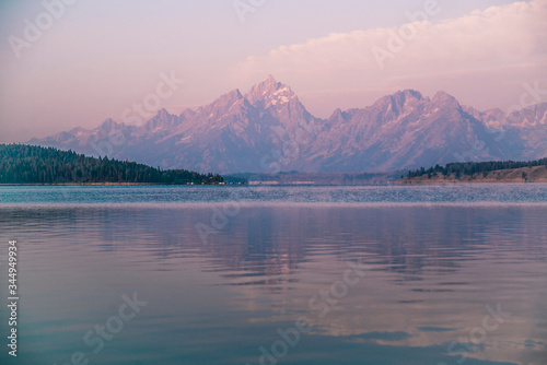Canvas Print purple mountains and reflection of  grand tetons in wyoming