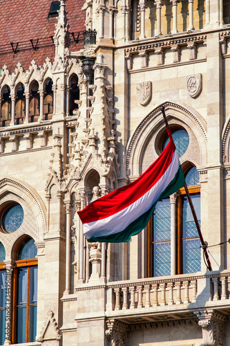 Photography National flag of Hungary on the Hungarian Parliament Building in Budapest