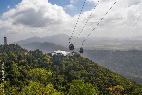 Panoramic view on mountains covered by trees from Sky Bridge in Langkawi Island. Vacation and holidays in Malaysia
