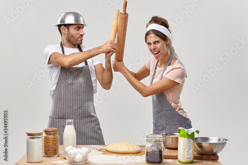 Fotografija Two opponents at kitchen