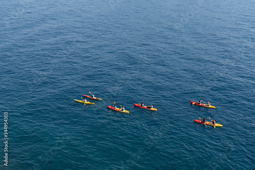 Top View of Tourist Paddling Kayak on the Ocean